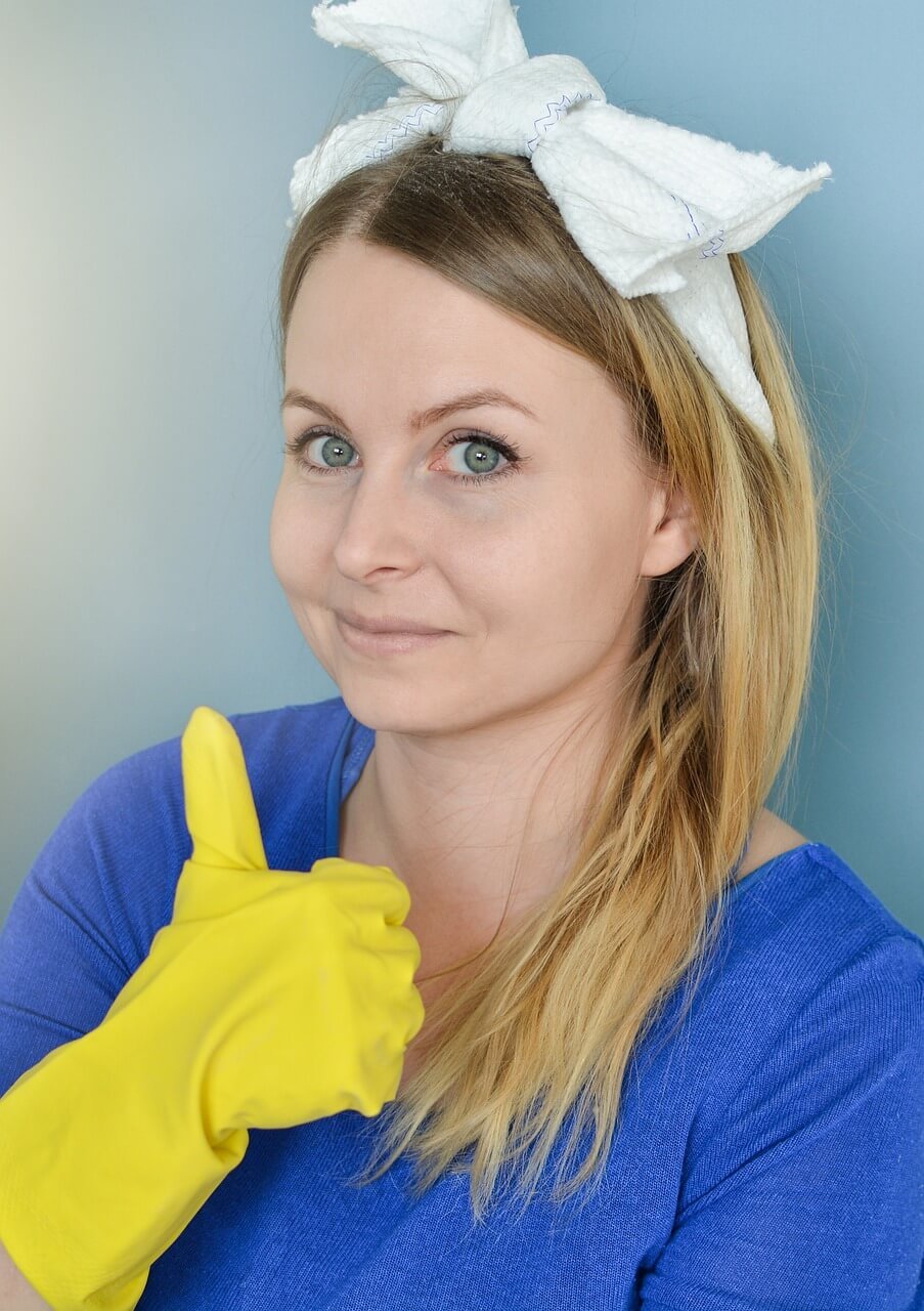 Professional cleaning staff member in uniform